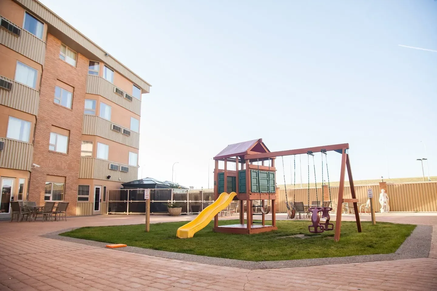The courtyard play court at Medicine Hat Lodge, Trademark Collection by Wyndham, Medicine Hat